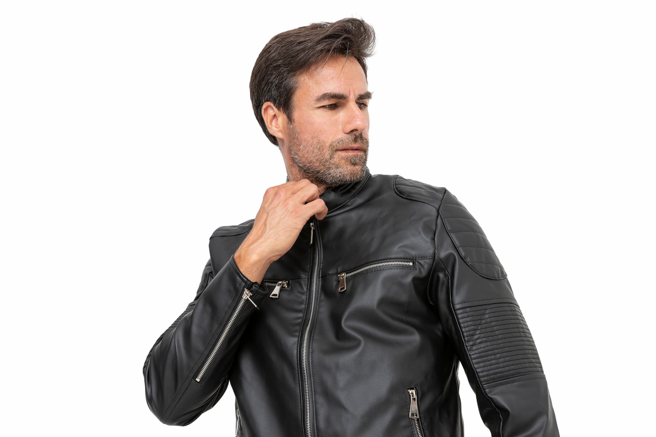 Rider wearing a slim fit biker jacket on a motorcycle